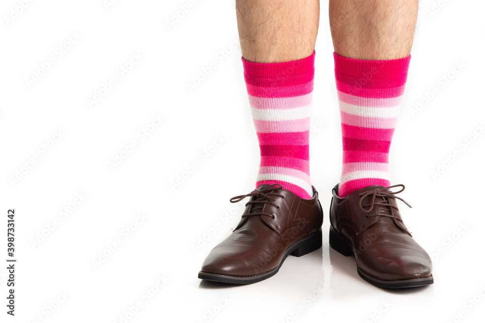 Men's feet in stylish shoes and funny socks Men's feet in stylish shoes and funny socks