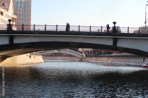 Small Krasnokholmsky and pedestrian Shluzovoy bridges over the Vodootvodny canal in Moscow photo