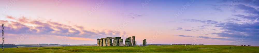 Stonehenge at sunrise panorama in England. United Kingdom 