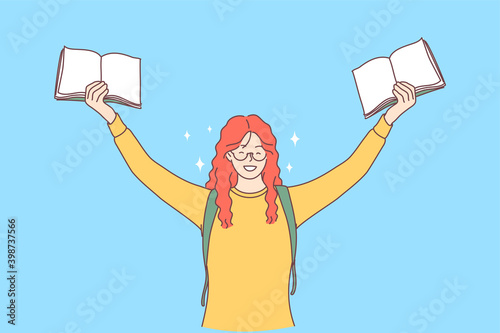 Excellent pupil, student, studying concept. Portrait of red haired cheerful happy girl with books in raised hands enjoying learning and having fun over blue background vector illustration