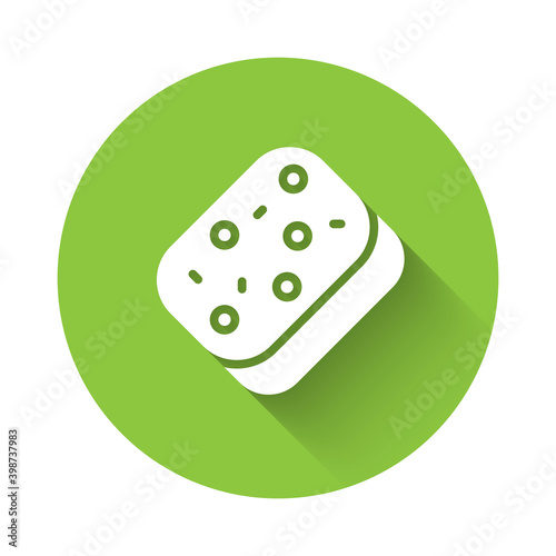 White Sponge with bubbles icon isolated with long shadow. Wisp of bast for washing dishes. Cleaning service logo. Green circle button. Vector.