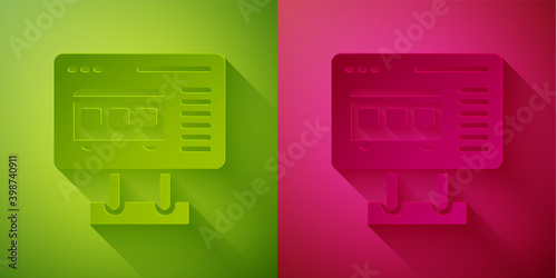 Paper cut Ticket office to buy tickets for train or plane icon isolated on green and pink background. Buying tickets. Ticket service. Paper art style. Vector.