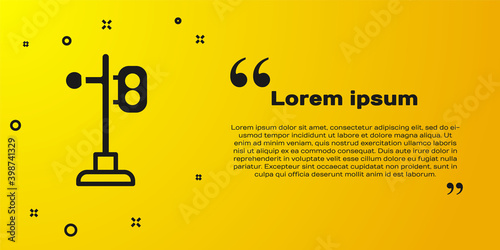 Black Train traffic light icon isolated on yellow background. Traffic lights for the railway to regulate the movement of trains.  Vector.