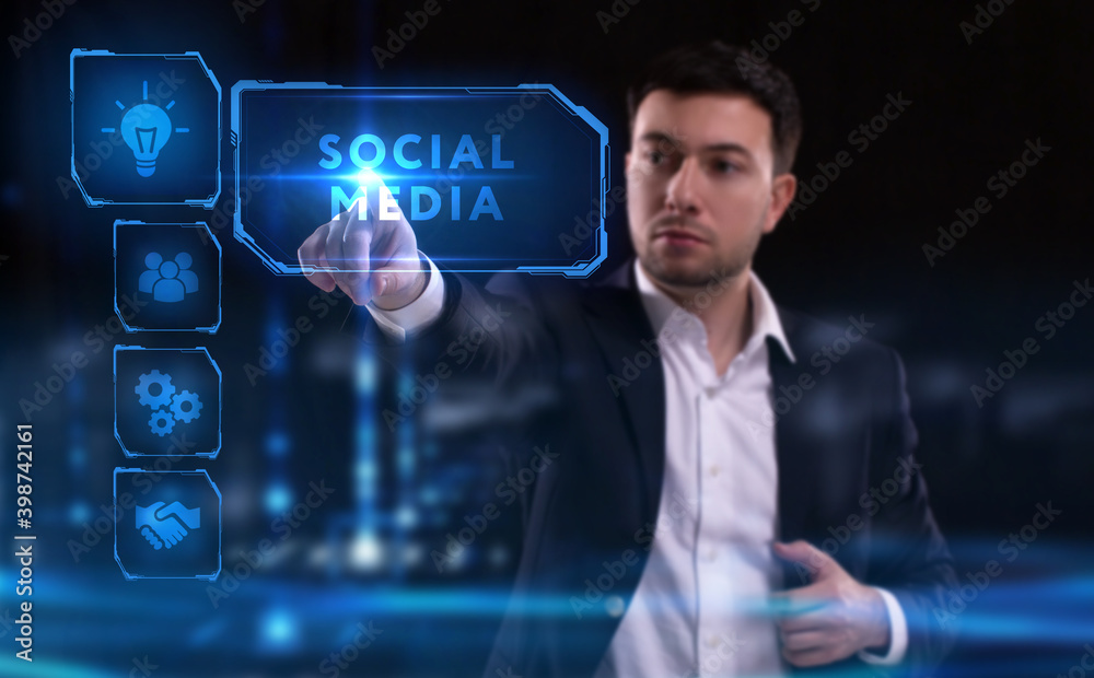 Business, Technology, Internet and network concept. Young businessman working on a virtual screen of the future and sees the inscription: Social media Business, Technology, Internet and network concept. Young businessman working on a virtual screen of the future and sees the inscription: Social media
