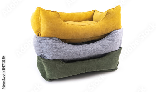 A stack of three beds for dogs and cats on a white background. Isolate