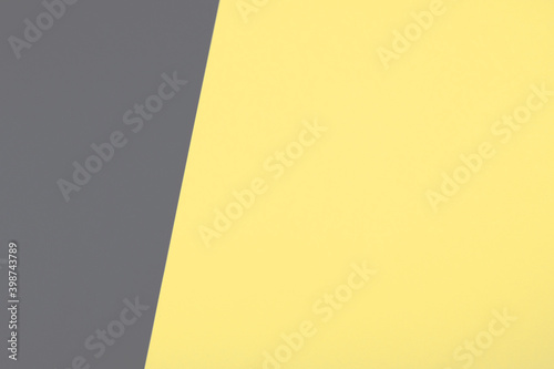Creative ultimate gray and illuminating yellow background as a backdrop with copy space. Main color trend of the year 2021.