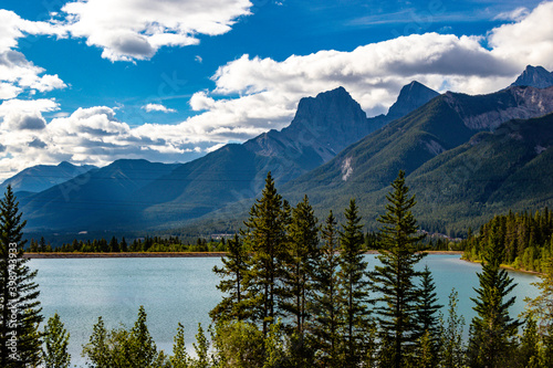 Three sisters overlook Quarry Lake. Canmore Nordic PP. Alberta, Canada