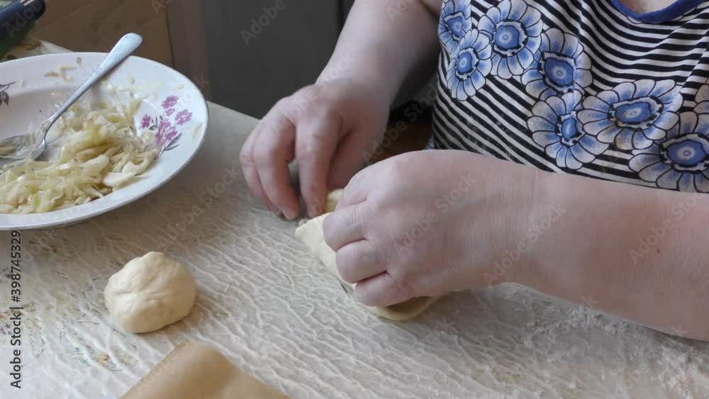 a Baker makes cakes with cabbage. healthy food concept a Baker makes cakes with cabbage. healthy food concept