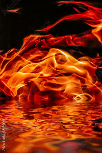 Obraz na płótnie Hot fire flames in water as nature element and abstract background, minimal desi