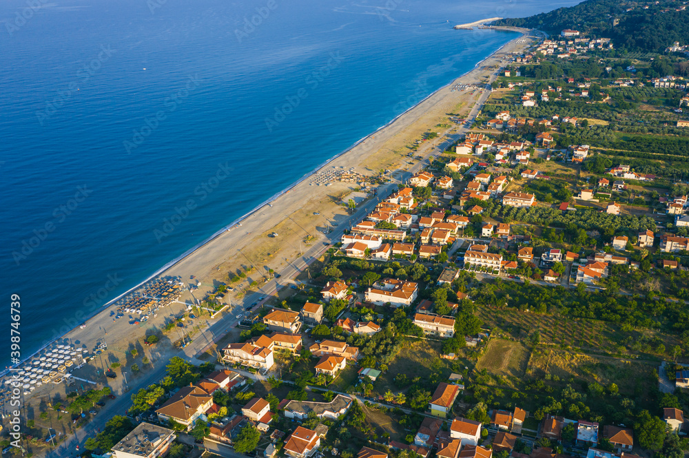 Fototapeta premium Agiokampos city aerial view and beach on Kato Sotiritsa, Greece