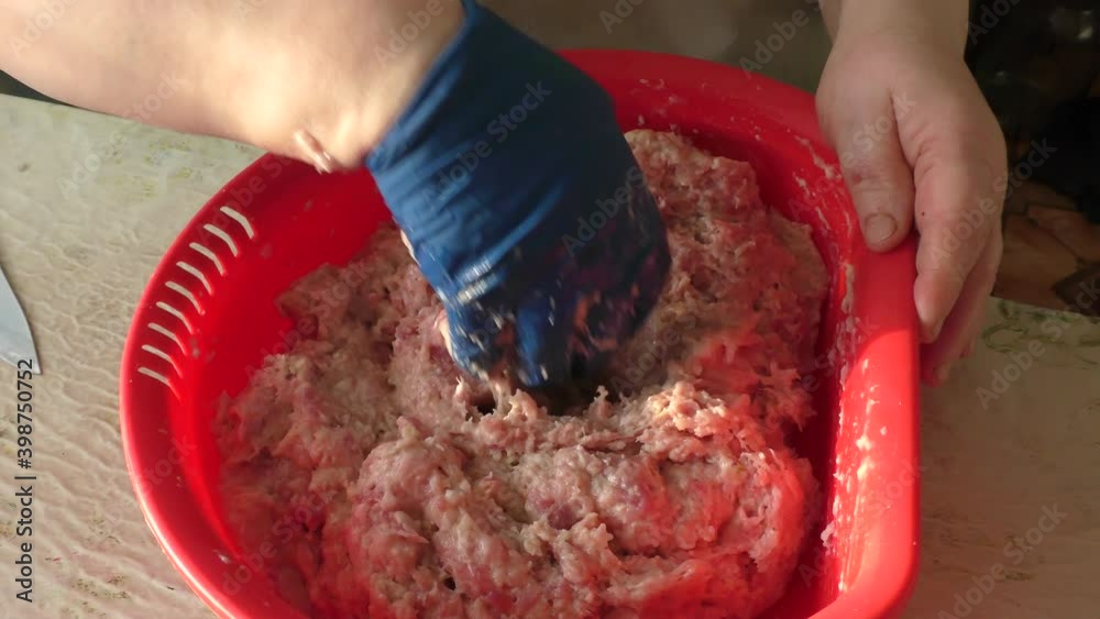 the chef makes burgers out of meat. healthy food concept the chef makes burgers out of meat. healthy food concept