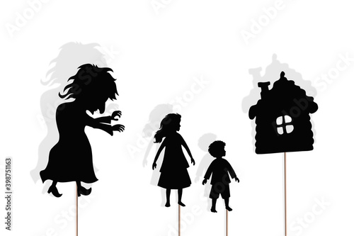 Fotografie Shadow puppets of boy, girl, witch and gingerbread house, isolated