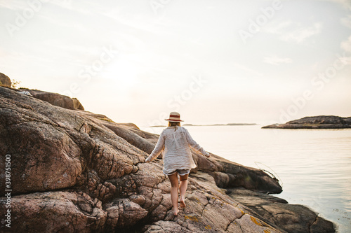 Woman walking at sea photo