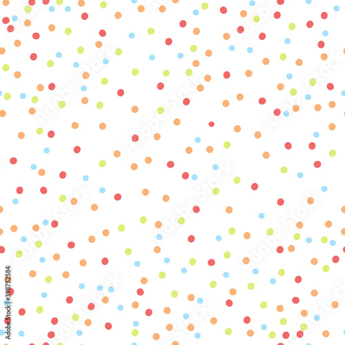 Festive colorful confetti scattered on white background, seamless vector pattern.