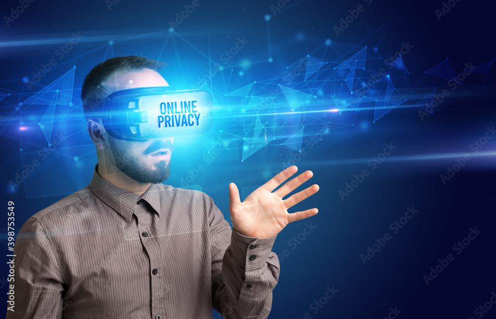 Businessman looking through Virtual Reality glasses with ONLINE PRIVACY inscription, cyber security concept Businessman looking through Virtual Reality glasses with ONLINE PRIVACY inscription, cyber security concept