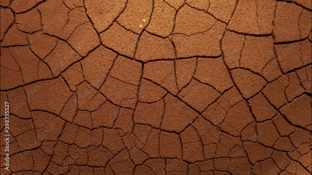 cracked soil in a desert drying out, timelapse. global climate change and drought. time lapse evaporation from soil. dry, cracked earth. increased temperatures, global warming, environment and ecology