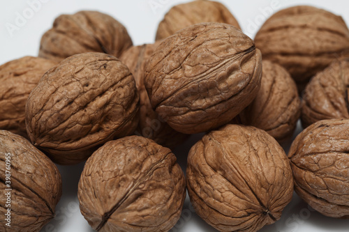 A scattering of walnuts in close-up