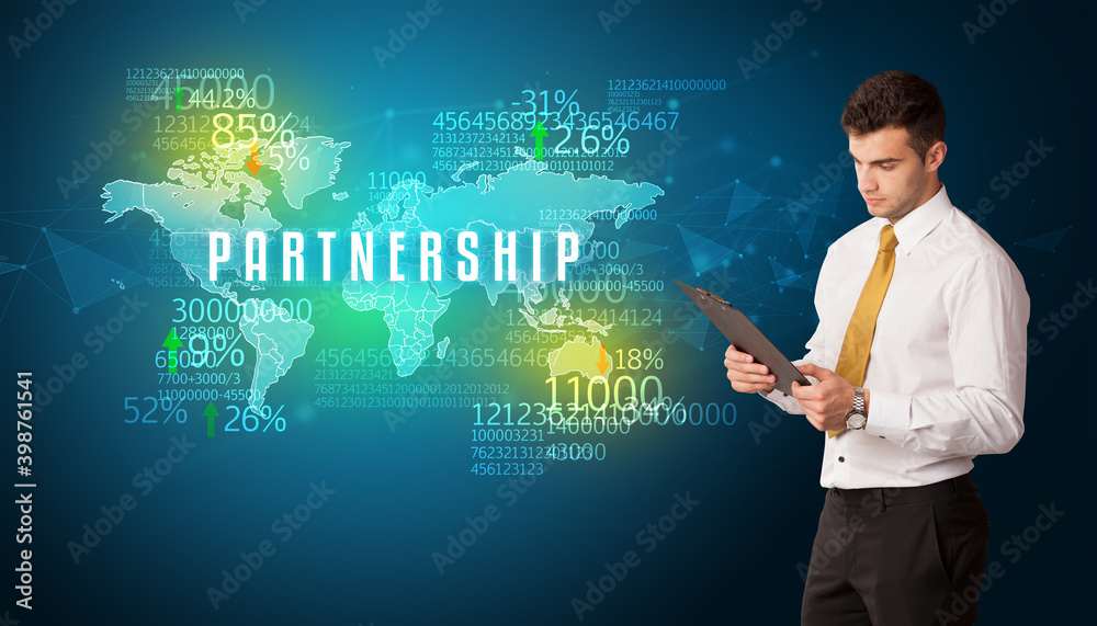 Businessman in front of a decision with PARTNERSHIP inscription, business concept Businessman in front of a decision with PARTNERSHIP inscription, business concept