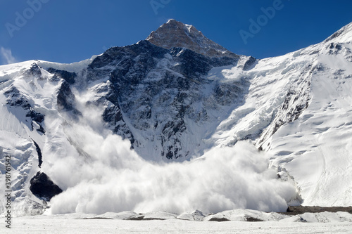Fotobehang Huge avalanche from Khan Tengri peak (7010 m), Central Tian Shan, Kazakhstan