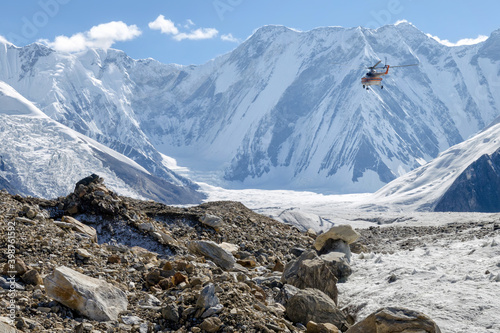 Helicopter above North Engilchek Glacier, Central Tian Shan, Kazakhstan - Kyrgyzstan.