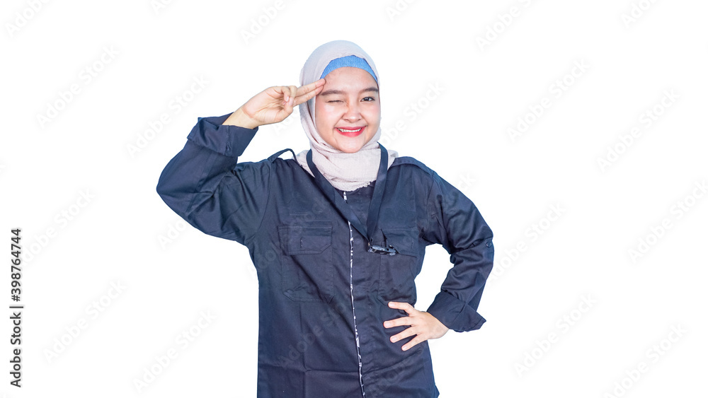 Yes sir! Portrait of responsible cheerful muslim woman with fancy red hair in white shirt saluting commander, listening order with obedient expression. indoor studio shot isolated on white background Yes sir! Portrait of responsible cheerful muslim woman with fancy red hair in white shirt saluting commander, listening order with obedient expression. indoor studio shot isolated on white background