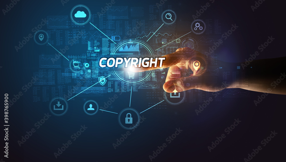 Hand touching COPYRIGHT inscription, Cybersecurity concept Hand touching COPYRIGHT inscription, Cybersecurity concept