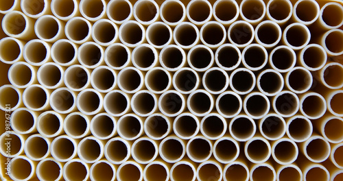 Paper pipes for drinking water. Abstract background. Banner