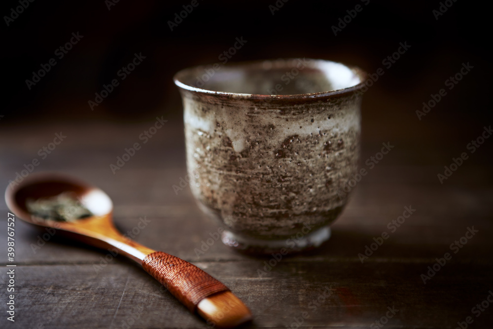 Traditional, japanese, handcrafted ceramic. Rustic wooden background. Close up. 