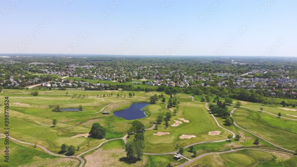 Beautiful terrain of a national park with lakes and golf courses against the backdrop of a small town in the US state of Illinois Beautiful terrain of a national park with lakes and golf courses against the backdrop of a small town in the US state of Illinois
