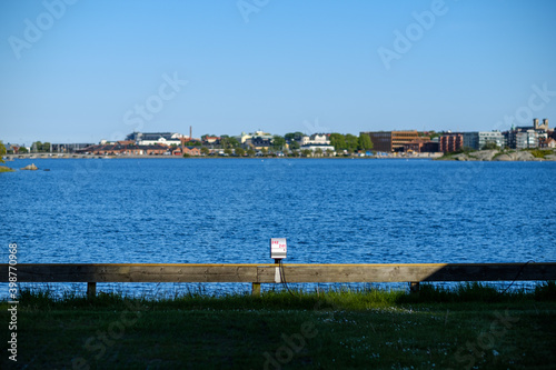 an empty spot on the campsite, right by the sea photo