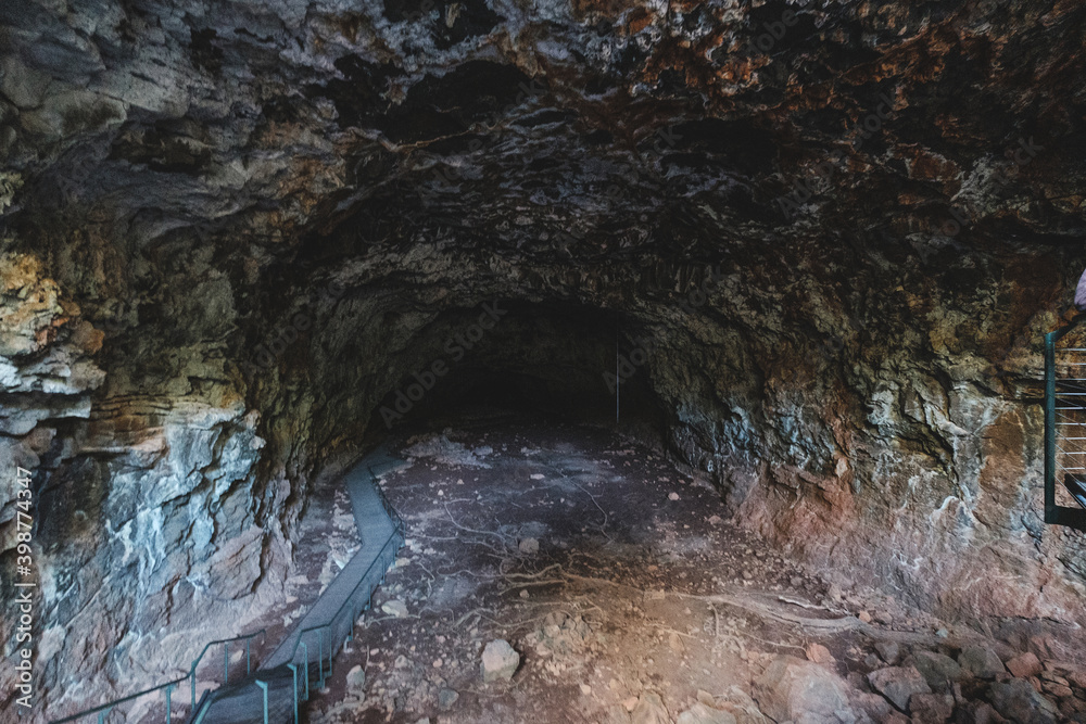 a cave with a river running through it a cave with a river running through it