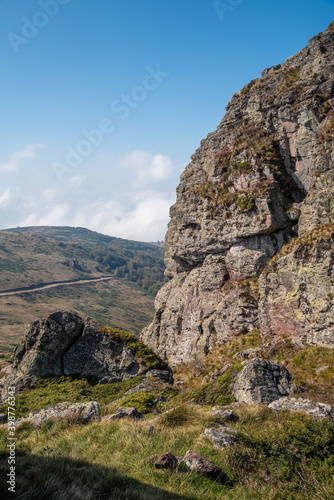 View from the top of Babin zub (The Grandmather's tooth) on Old mountain, which is the most beautiful peak of Stara planina ( Balkan mountains).The impressive and big striking rocks and dense plants.