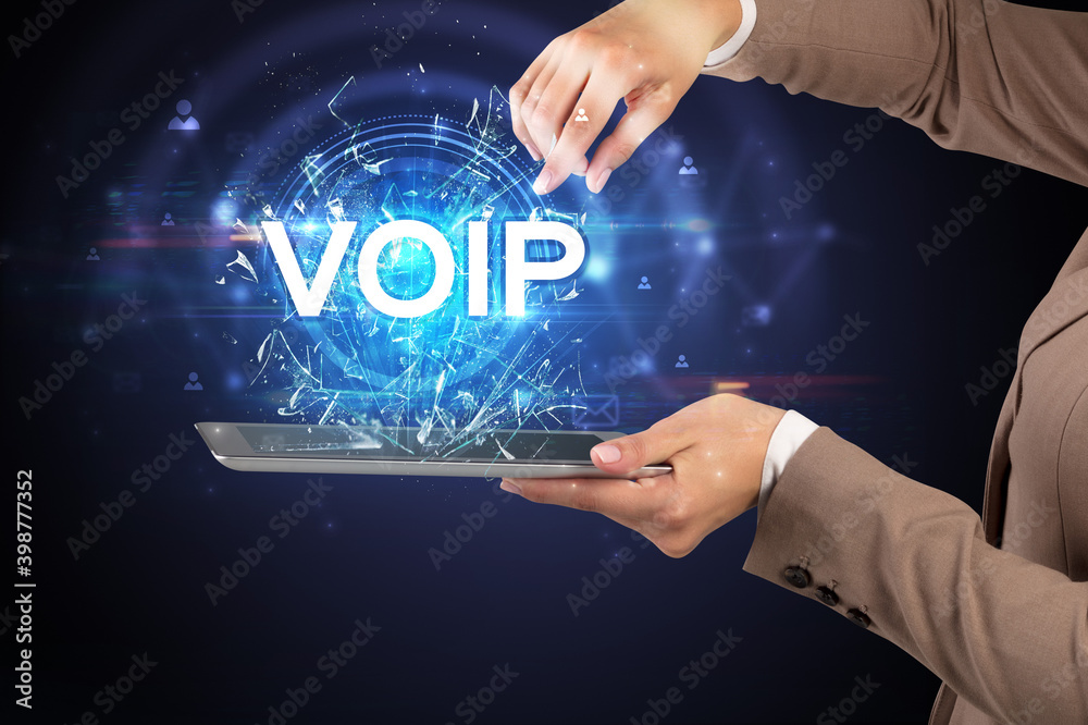 Close-up of a touchscreen with VOIP abbreviation, modern technology concept Close-up of a touchscreen with VOIP abbreviation, modern technology concept