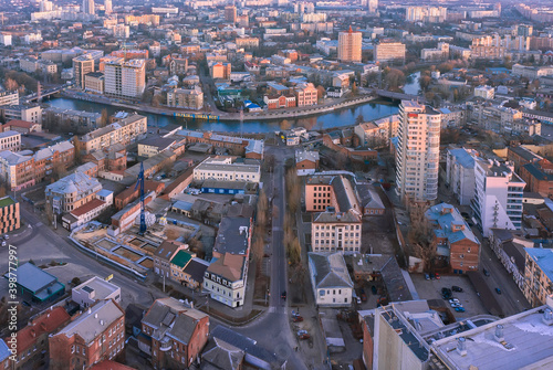 KHARKIV, UKRAINE - December 6th, 2020: Aerial view to the center of the city with historic buildings, Kharkiv river and Gromadyanska street