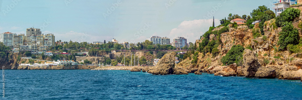A view from the sea towards the old harbour of Antalya in the summertime