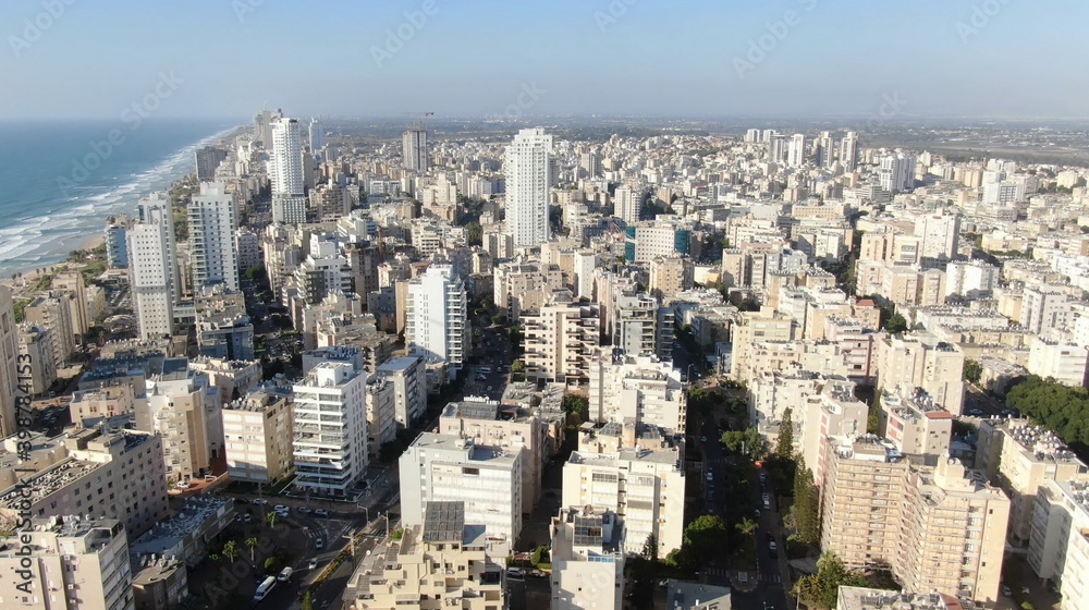 Netanya, Israel from a bird's eye view. Top-down view of the city during the Yom Kippur holiday, when all highways and roads are empty. Cars are not allowed to drive on this day