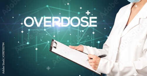 Doctor fills out medical record with OVERDOSE inscription, medical concept