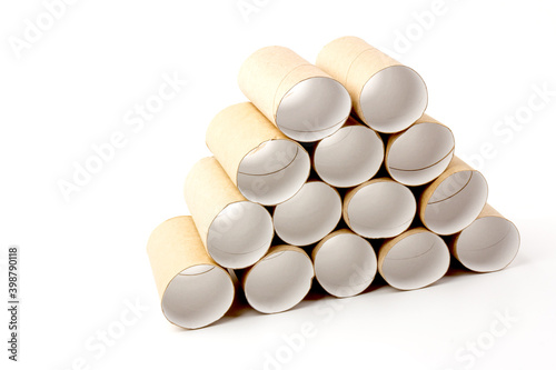 empty paper toilet rolls on white background