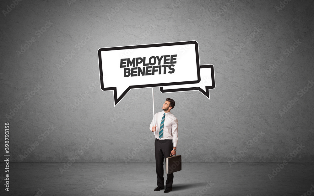 Young business person in casual holding road sign with EMPLOYEE BENEFITS inscription, new business idea concept Young business person in casual holding road sign with EMPLOYEE BENEFITS inscription, new business idea concept