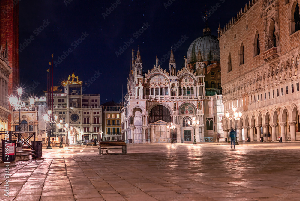 St Mark's Square bell tower at night in Venice during the crownvirus without people 