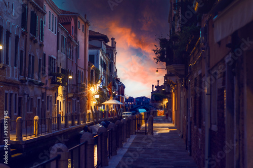 typical Venetian alley called calle at sunset without anyone because of the covid 19 © Emanuele