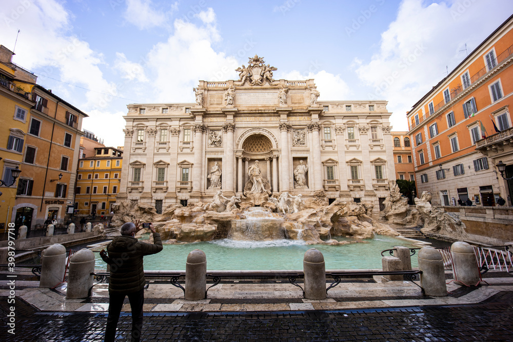 Trevi Fountain, Fontana di Trevi in ​​Rome. The Trevi Fountain is the largest Baroque fountain, it is one of the most famous symbols of Rome. Rare shots in lockdown with empty square. 