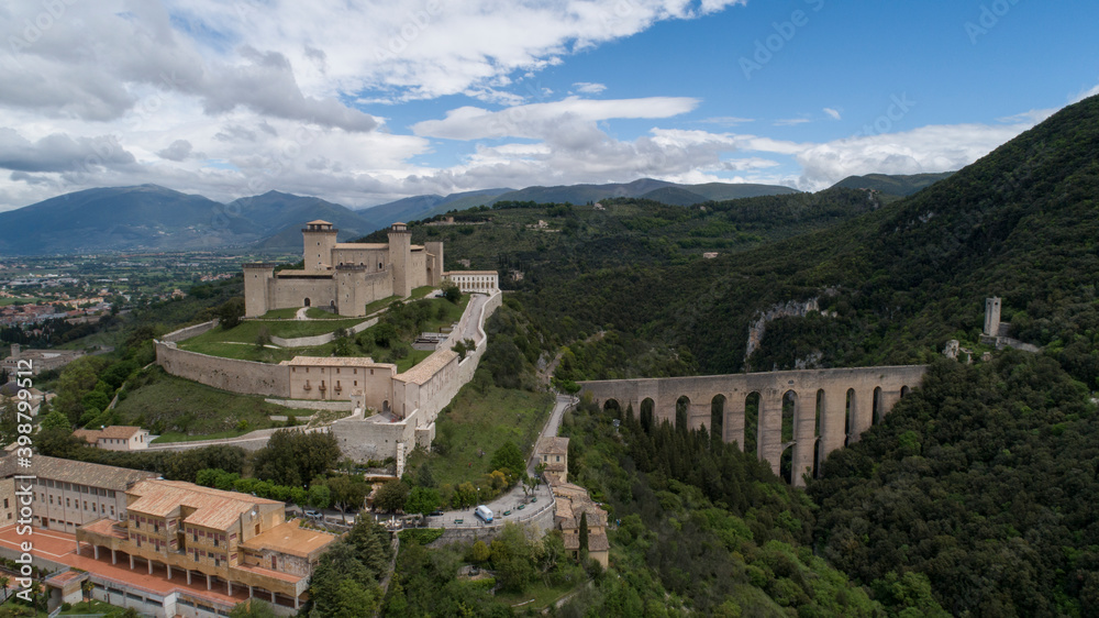 Fototapeta premium Ponte delle Torri and Rocca Albornoziana in Spoleto, aerial photography with drone, panorama of the city and typical medieval buildings