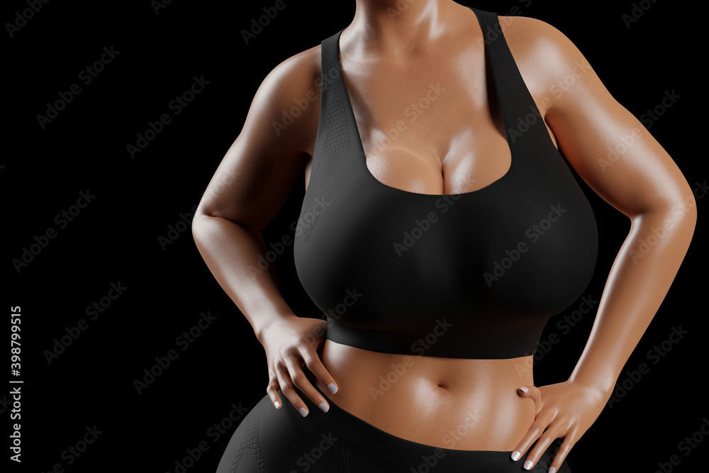 Young slim woman with big breasts in black sportswear Young slim woman with big breasts in black sportswear