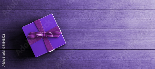Mock-up poster, luxury purple gift box with satin bow on distressed purple wood planks background, night scene, 3D Render, 3D Illustration