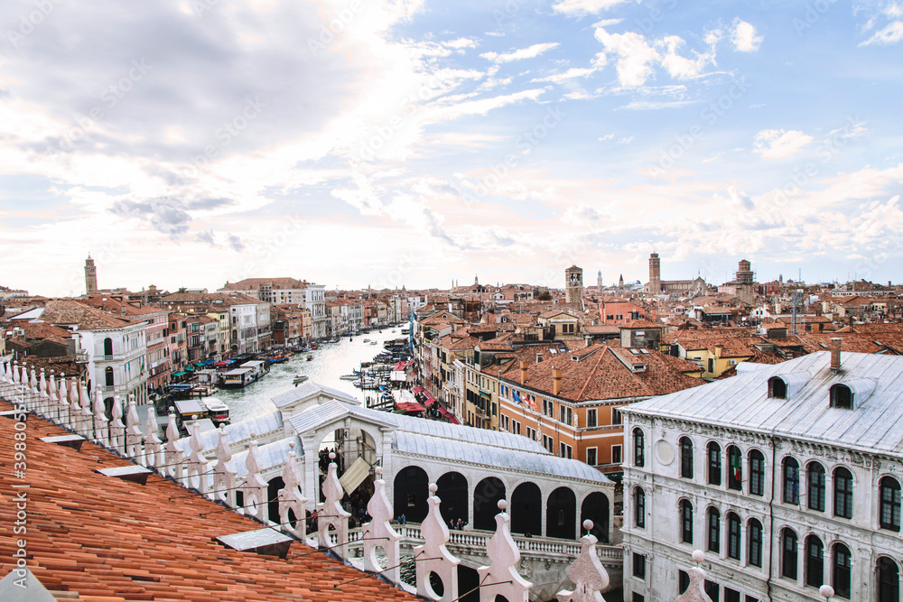 
panorama from above of the city of Venice where you can see the canals navigated by the gondolas and a detail of the Rialto Bridge. The architecture and structure of the city is unique