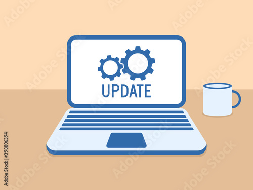 Update gear logo - Blue Laptop on a table with a mug