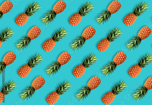 Creative 3d illustration of pineapple's row on a blue background.
