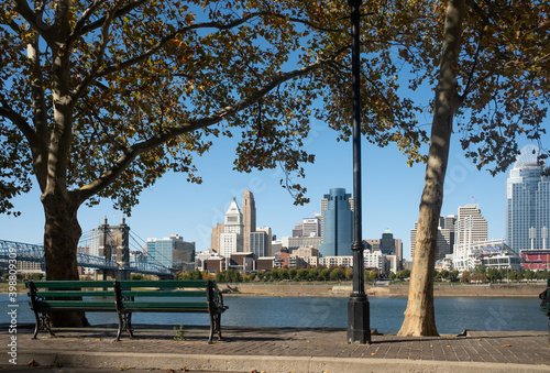 Downtown Cincinnati Ohio on a Sunny Day with the Ohio River in the Foreground photo