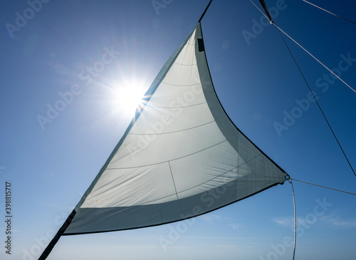 Sunburst Behind Full Sail